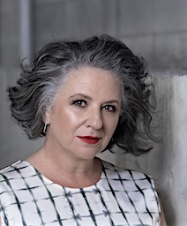 Woman with hair that has been transitioned to grey with Expert Grey